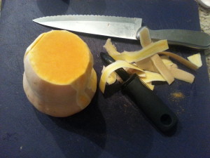Cut the ends off the butternut squash and peel the skin with a peeler.