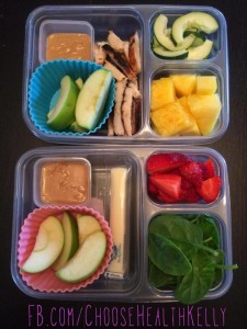 (Apple slices with Peanut Butter.  One kid has leftover grilled chicken, cucumbers and pineapple.  The other got Organic Sting Cheese, Strawberries and Spinach.)